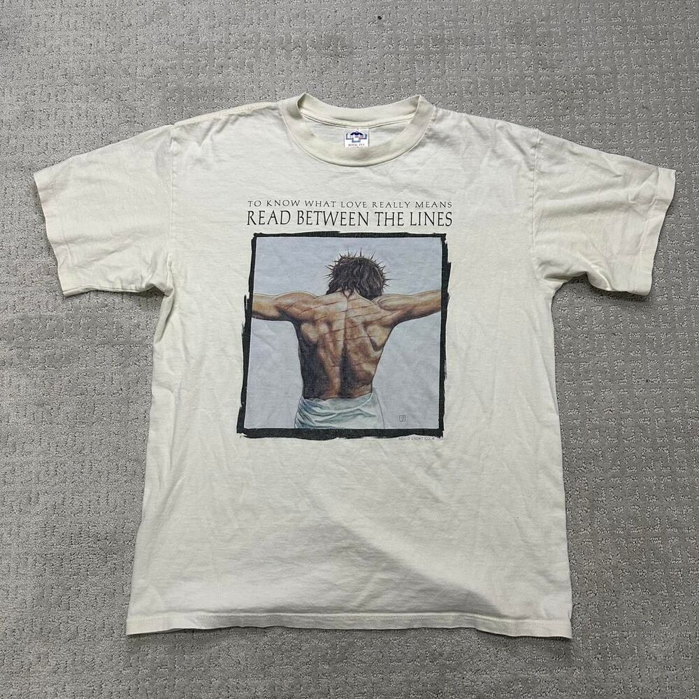 1990s Jesus graphic tee with "read between the lines" design